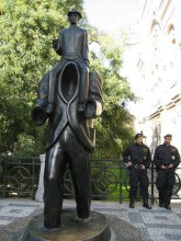 kafka statue in Prague, watched by the police